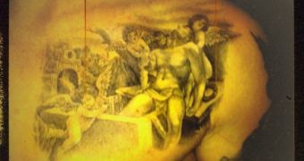 David Beckham unveils chest tattoo: Jesus and cherubs, himself and his three sons
