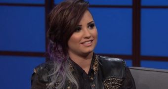 Demi Lovato promotes new tour, talks about mermaids and aliens on Seth Meyers