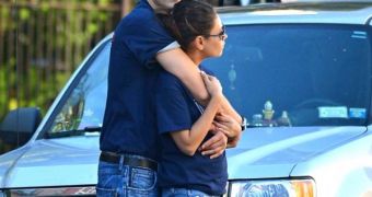 Ashton Kutcher, still legally married to Demi Moore, with his current girlfriend, Mila Kunis
