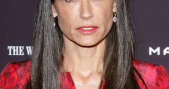 Paparazzo claims Demi Moore hit him, tried to grab his camera and swore at him during recent encounter