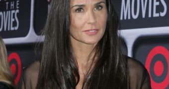 Demi Moore is after Ashton Kutcher’s money, thinks she’s entitled to half of his earnings after the split
