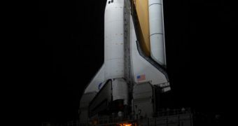 Discovery is seen in this image sitting aboard the Crawler-Transporter vehicle