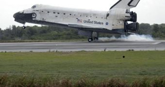 Space shuttle Discovery is seen here landing at the KSC, after successfully completing its mission to the ISS