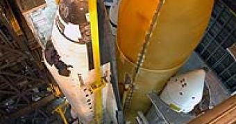 Discovery inside the Vehicle Assembly Building while being attached to the external fuel tank and the solid rocket boosters