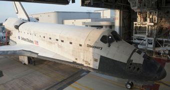 Discovery is seen here entering the OPF-2 after completing its last mission, STS-133