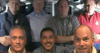 A picture of the crew currently aboard the STS-119 Discovery mission