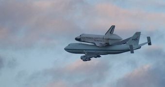 SCA 905 is seen here carrying Discovery, as the shuttle is being flown from Florida to Virginia in April 17, 2012