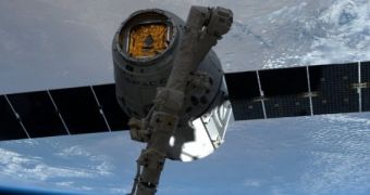 The SpaceX Dragon capsule was grappled via the ISS' robotic arm on April 20, 2014
