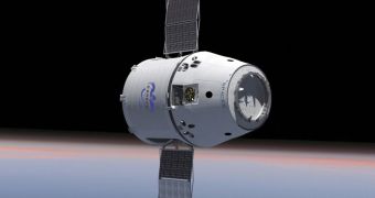 The unmanned version of the Dragon space capsule is seen here approaching the ISS in this artist's rendering