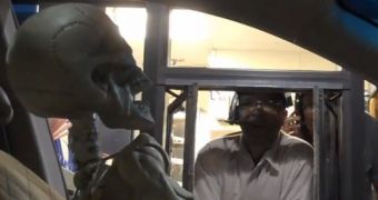 A skeleton is left ordering food in a drive-thru