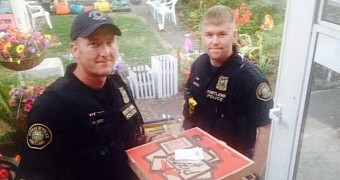 Police officers deliver pizza to man's house