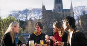 An image showing Durham University students enjoying a picnic with Durham Cathedral in the background