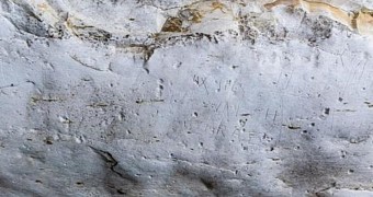 Photo shows graffiti etched into 1,700-year-old water cistern by WWII soldiers