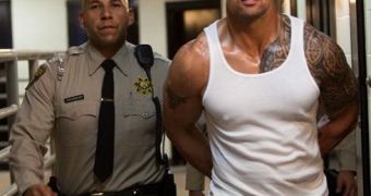 Dwayne Johnson in an official movie still from “Faster,” now out in US theaters