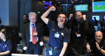 Rosetta mission controllers at ESOC react to receiving the first signals from the spacecraft in more than 31 months, on January 20, 2014
