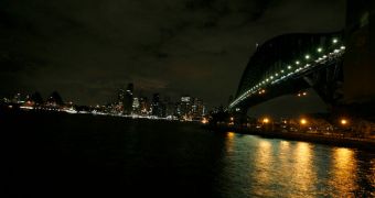 Photograph shows Sydney Harbour after the lights are switched off for Earth Hour 2011