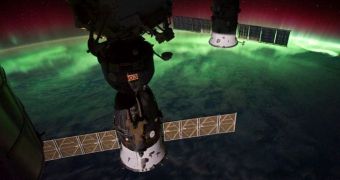ISS image depicting auroras from above