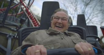 70-year-old woman rides the roller coaster for the first time and she's having the time of her life