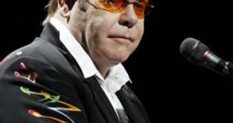 Sir Elton John cancels concerts after being taken to the hospital with a severe bout of flu and E.coli infection
