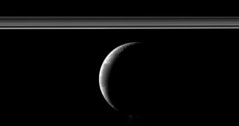 Cassini captured this view of the crescent Enceladus on January 4, 2012