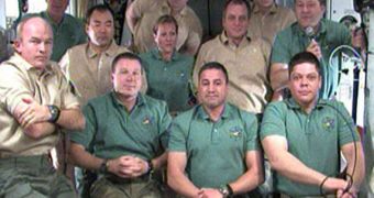 The joint crew of Endeavor and the ISS responds to questions from reporters on Earth
