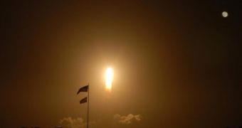Endeavour's launch eclipsed the nearly-full Moon