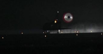 Endeavour lands at the KSC in pitch-black darkness, after completing its last mission ever
