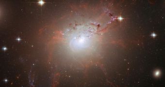 This view of NGC 1275 shows the massive gas filaments stretching out from its core