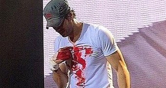 Enrique Iglesias Slices Fingers Trying to Grab Drone in Concert - Video