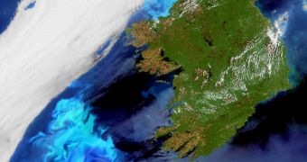 Electric blue-colored plankton blooms swirl in the North Atlantic Ocean off Ireland in this Envisat image