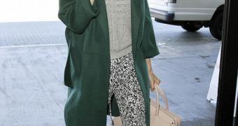 Eva Mendes sparks pregnancy rumors when she avoided the full body scan at the airport