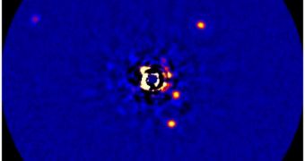 This adaptive optics image collected by the Keck Observatory shows the peculiar HR 8799 star system in its entirety