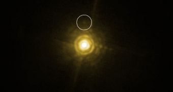 Faint light trace of an exoplanet about 130 light-years away, orbiting its Sun-like companion
