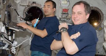 Flight Engineers T.J. Creamer (foreground) and Soichi Noguchi both work in the Kibo laboratory of the International Space Station