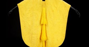 Golden spider silk garment showcased by the Victoria & Albert Museum in London