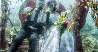 The couple celebrated their special day 39ft (12m) below the surface