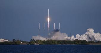 This picture shows Falcon 9 roaring to the skies in December 2010, carrying the unmanned Dragon space capsule