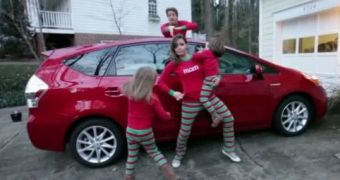 The family raps about their new red Prius matching their jammies