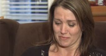 Karla Begley cries as she reads letter she received telling her she should euthanize her autistic boy