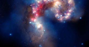 The collision, which began more than 100 million years ago and is still occurring, has triggered the formation of millions of stars in clouds of dusts and gas in the galaxies