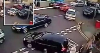 Pedestrian gets caught between three cars in massive crash