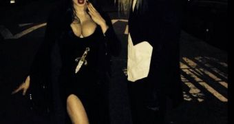 Fergie as Elvira and husband Josh Duhamel as Riff Raff at Kate Hudson’s Halloween party