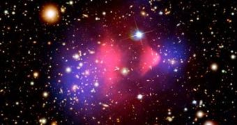 A new photo from NASA of the Bullet Cluster showing what is believed to be dark matter (represented in blue) in the photo.