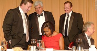 First Lady Michelle Obama struggling to send her first tweet using an iPhone