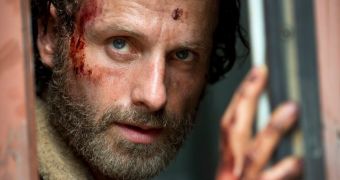 The first official photo from the upcoming fifth season of “The Walking Dead” is released