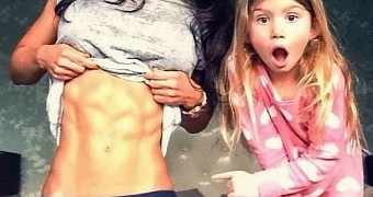 Fit Mom Abby Pell Criticized for “I’ve Got a Kid, a Six Pack and No Excuse” Photo
