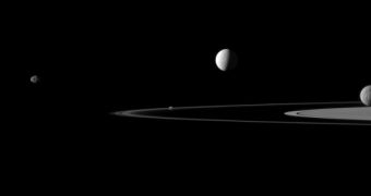 From the left: Janus, Pandora, Enceladus, Mimas and Rhea (obscuring Saturn itself)