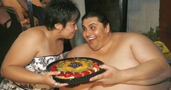 Manuel Uribe and his wife, whom he credited with helping him lose half his body weight, down from 1,230 pounds (560 kg)
