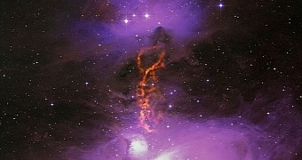 Image shows the OMC-2/3 star-forming filament in the Orion Molecular Cloud Complex