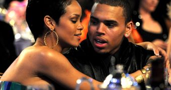 Friends are desperate to stop Rihanna from getting back together with Chris Brown, says report